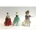 Three Royal Doulton figurines: HN3970 'Flower of Love', HN4093 'Emily', HN3626 'Lily', the tallest