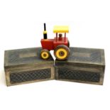 Two decorative storage boxes, 26x34x16cm, together with a wooden toy tractor
