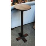 A pot stand with slender ring turned column, 31cmD 81cmH