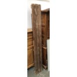 A vintage slatted pine trestle bench, 181cmL