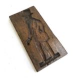 A Dutch board carved with a lady one side and a gentleman the other, 'No XXI' carved to one side,
