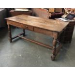 An oak refectory table, incorporating 18th century elements, the top with cleated ends, on turned