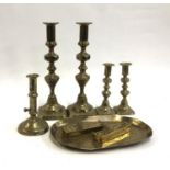 An 18th century and later brass ejector candlestick, 16.5cmH; together with two further pairs of