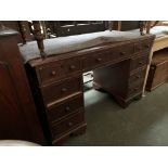 A pedestal desk, nine drawers on bracket feet, 122x61x78cmH