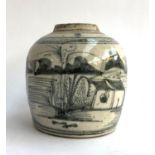 A Chinese ginger jar with black and white decoration of a boat on the water, marks to base, 15.5cmH
