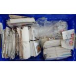 A large quantity of First Day Covers, together with loose stamps, stamped envelopes and empty albums