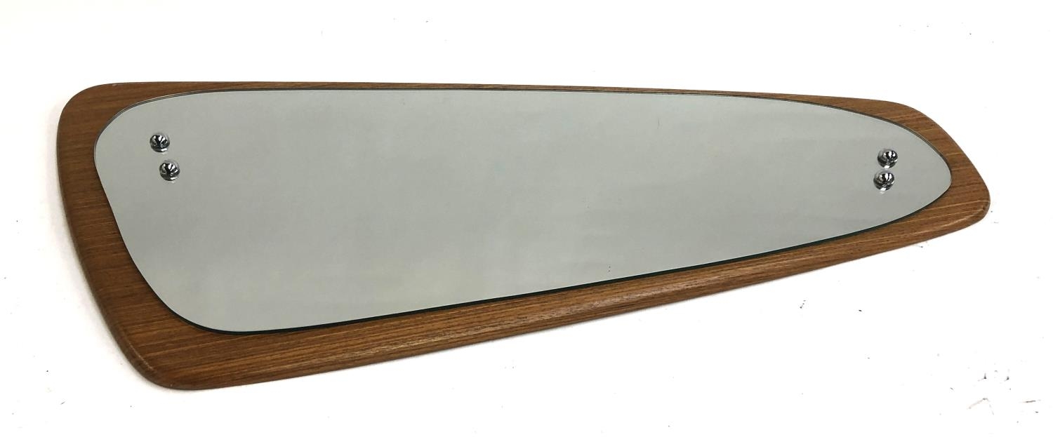 A mid century shaped teak mirror, approx. 77cmL