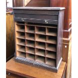 A late 19th century oak tambour fronted filing cabinet, comprising pigeonholed interior, 63x29x76cmH