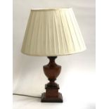 Interiors interest, a simulated burr wood baluster vase form table lamp on square plinth base,