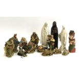 A set of resin nativity figures, and other to include carved wooden Thai deity