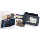 A Royal Mail Millennium Collection set containing presentation packs from January 1999 - October