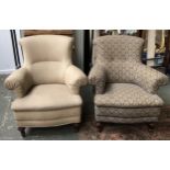 A pair of 20th century armchairs (in different fabrics), outward scrolling arms and turned legs,