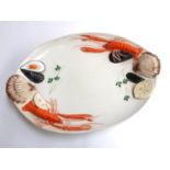 A Cre Art, Italy, serving platter decorated with crayfish and other seafood 51cmL