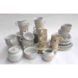 A Poole pottery 'Peony' part tea service to include teacups, saucers, cake plates, cream jug, bowls,