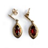 A pair of 9ct gold and marquise cut garnet earrings, 2.6g