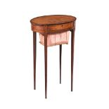 A George III oval satinwood and rosewood banded work table, c.1790, with ebony-strung frieze and
