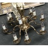 A large brass 12 arm chandelier, approx. 70cmD