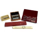 A collection of drawing tools to include a cased EcoBra Universal set 6499C; PIC slide rule,