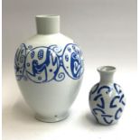 A decorative blue and white ceramic lamp base, together with one other blue and white ceramic