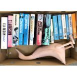 A box of books by Jeremy Clarkson, together with a standing wooden duck