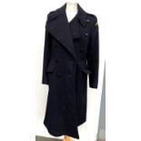 A women's navy double breasted greatcoat for the Civil Defence Corps, size 10, together with a