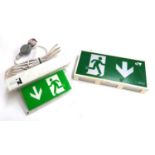 Two illuminating emergency exit signs, the largest 42x20cm