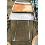 A galvanised metal garden potting table with three removeable top trays, 52x125x77cm