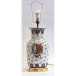 A Samson style armorial table lamp, hand painted with floral sprays and heightened in gilt, 46cmH to