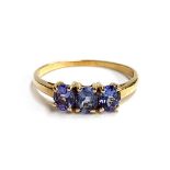 A 14ct gold and tanzanite ring, size R 1/2, 2g