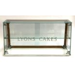 A vintage Lyons Cakes glass display cabinet with sliding doors and single shelf, ceramic base, 76cmW