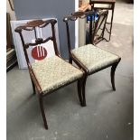 A pair of 19th century rosewood sidechairs, with carved top and midrails (one midrail missing)