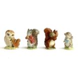 Four Beswick Beatrix Potter figurines comprising Old Mr Brown, Timmy Tiptoes, Squirrel Nutkin, and