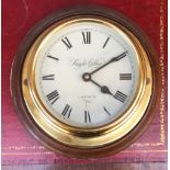 A Knight & Gibbins wall clock, approx. 26cmD