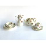 A miniature part tea service with rosebud design, comprising Hammersley and Alsagar Hayward & Co.