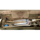 A Jaques croquet set, in as found condition, comprising three mallets, several balls, a full set