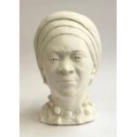 A large plaster bust of a lady in headscarf, 44cmH