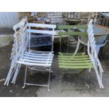 A set of four white painted folding metal garden chairs + one green (5)