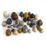 Approximately 30 mineral specimen eggs, of varying size, to include sodalite, labradorite, jasper,