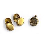 A pair of gold cufflinks, 4.3g; together with a 19th century yellow metal glazed locket (af)