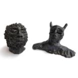 Two terracotta sculptures Devil Head, 22cmW & Wild Man, 14cmH