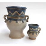 A large Carol Scott Studio Pottery salt glazed twin lugged vase 23cmH together with a small Carol