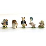 Five Beswick Beatrix Potter figurines comprising Tommy Brock, Miss Tiggy-Winkle, Pigling Bland,