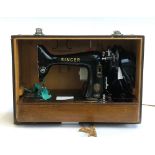 A Singer sewing machine model no. EJ154718