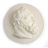 A classical relief plaster roundel, 40cmD, marked to reverse 'P.J Hone, 2015'