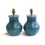 A pair of blue glazed ceramic table lamps, 22cmH to top of base