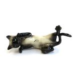 A Beswick figurine of a siamese cat, 16cmL
