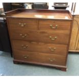 A late 19th century large mahogany chest of two short over three long drawers, on bracket feet,