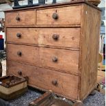 A Victorian pine chest of two short over three long drawers, on bun feet, 109x50x100cmH