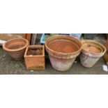 A large terracotta pot, together with 4 others (5)