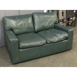 A green leather two seater sofa, 140cmW